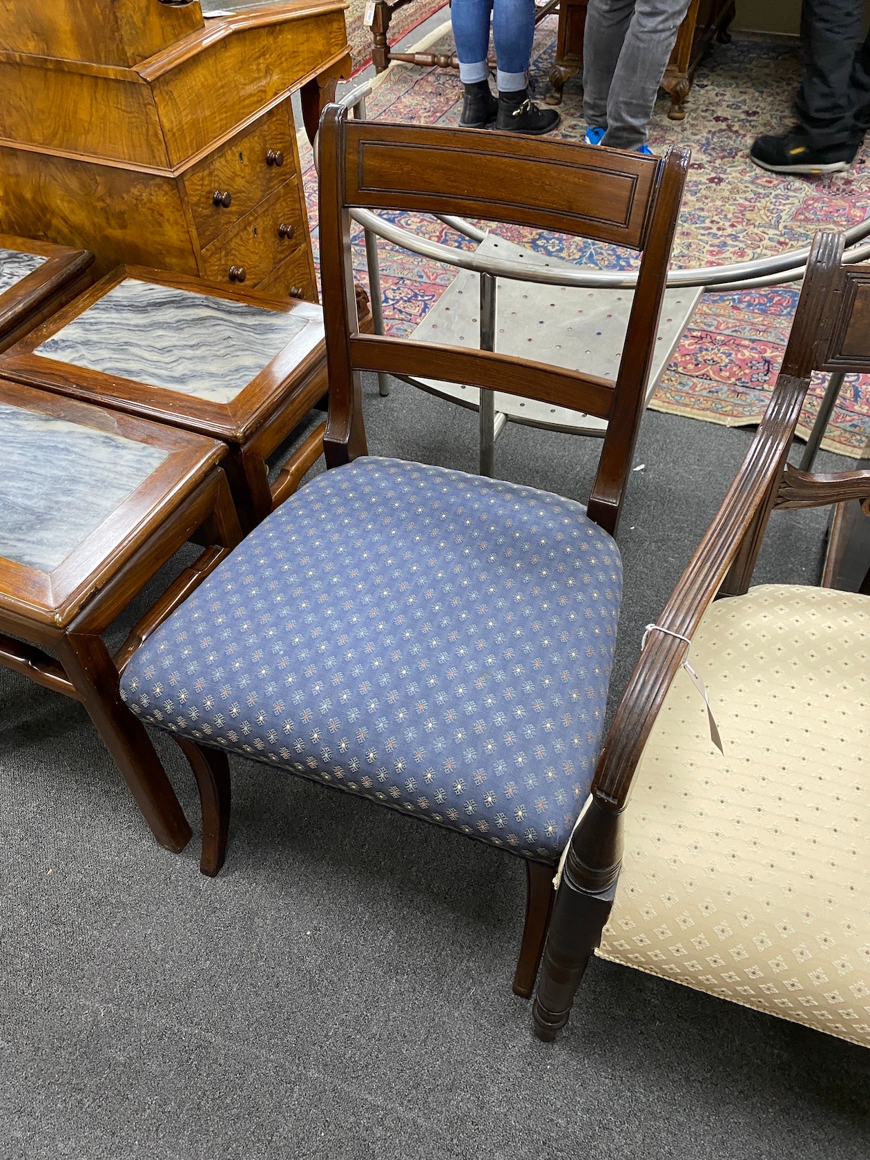 A late Sheraton mahogany elbow chair and a pair of Sheraton mahogany single chairs